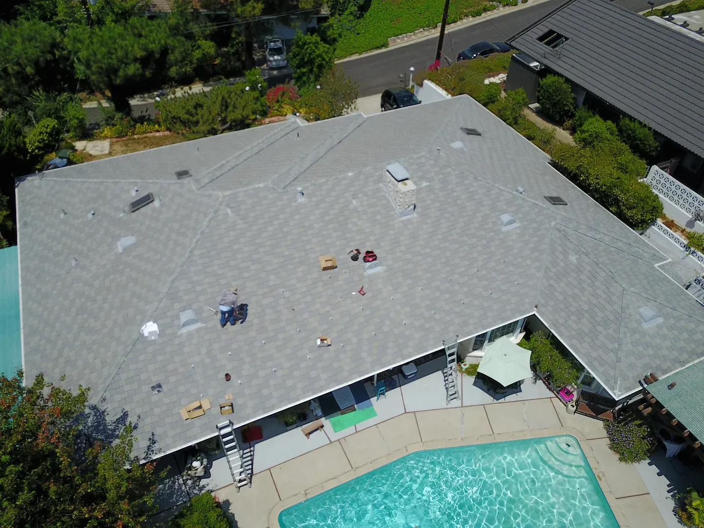 Solar installer on clay tile roof, La Cañada Flintridge solar installation