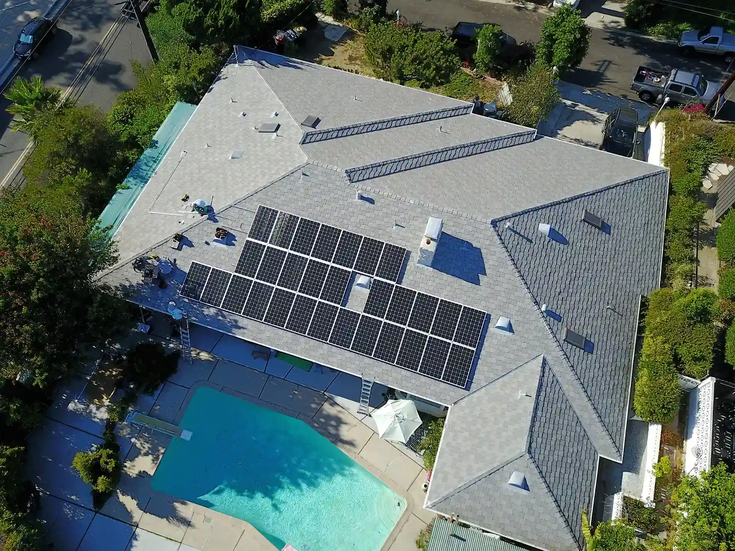 Cali Energy crew installing solar on clay tile roof in La Cañada Flintridge