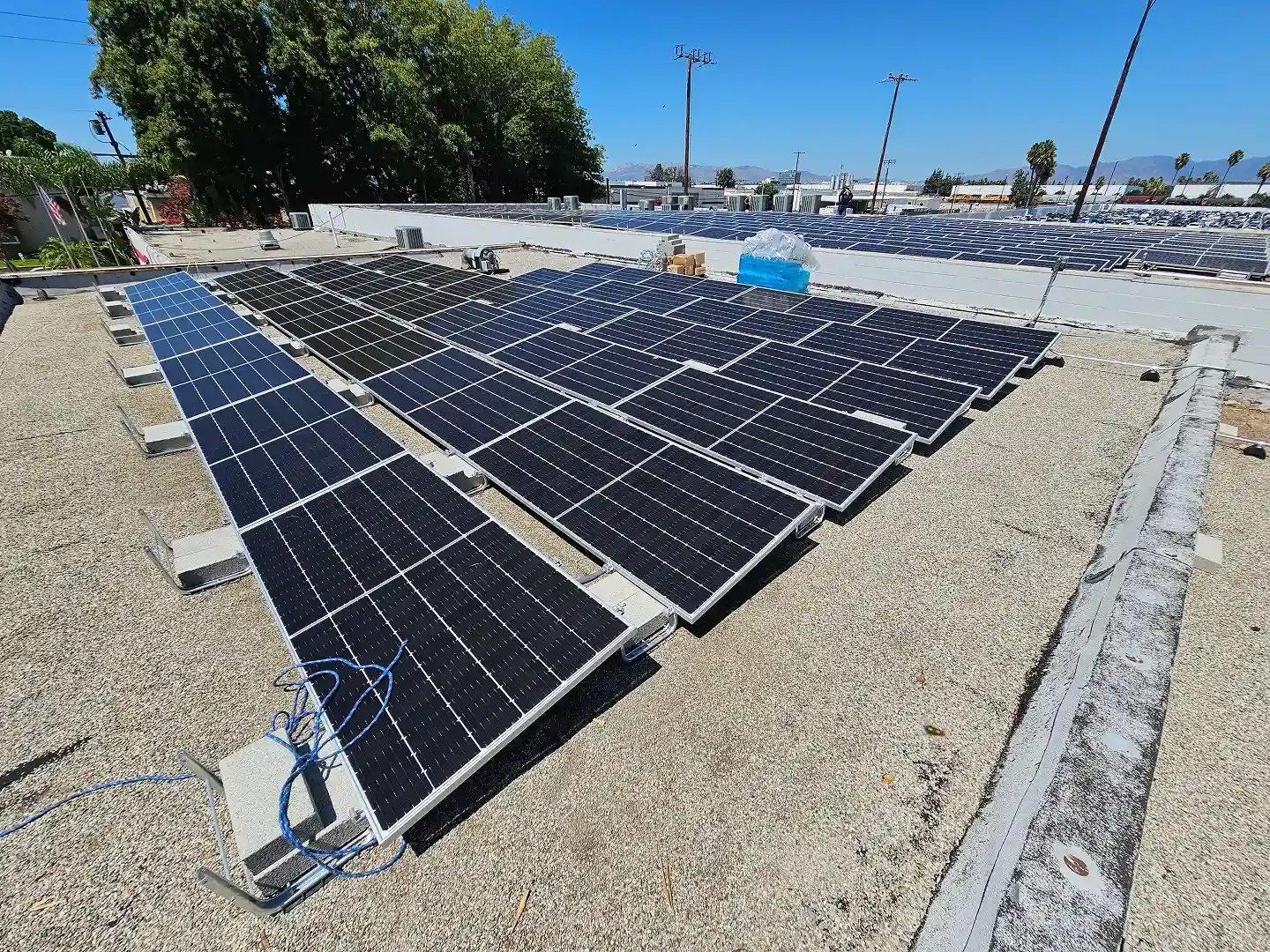 Cali Energy crew on commercial flat roof in Van Nuys CA