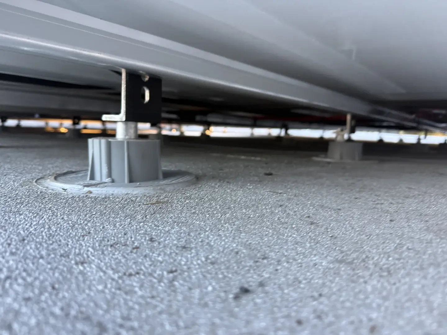 Solar panel mounting standoff with flashing on flat roof, Westlake Village CA