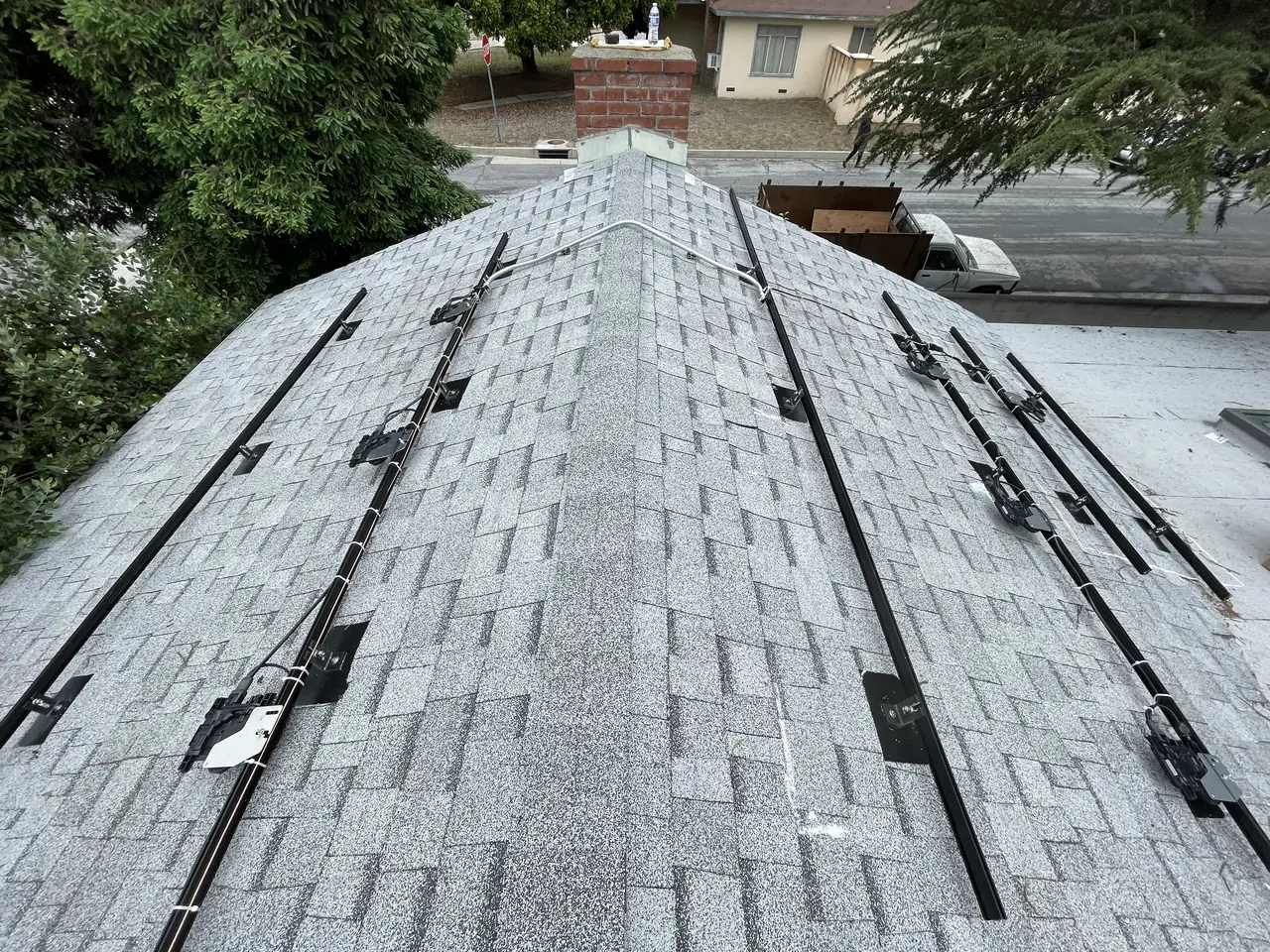 5.6 kW solar panel array on a composition shingle roof in Altadena, CA