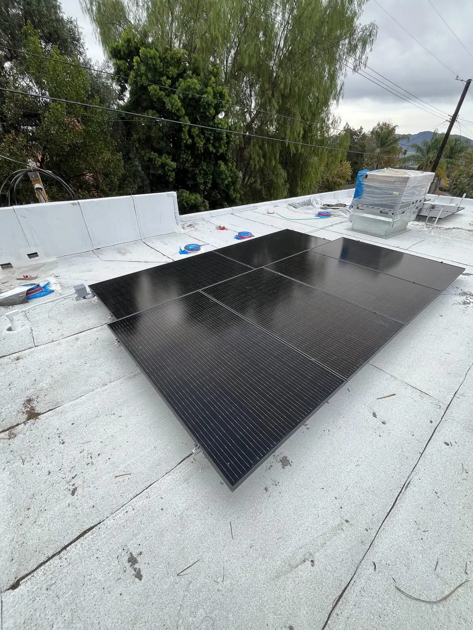 9.72 kW solar panel array on a flat roof in Burbank, CA