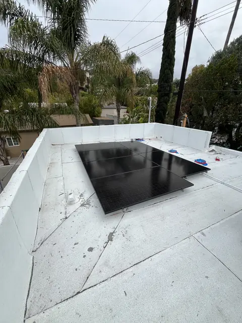 Solar panel mounting detail on a flat roof in Burbank, CA