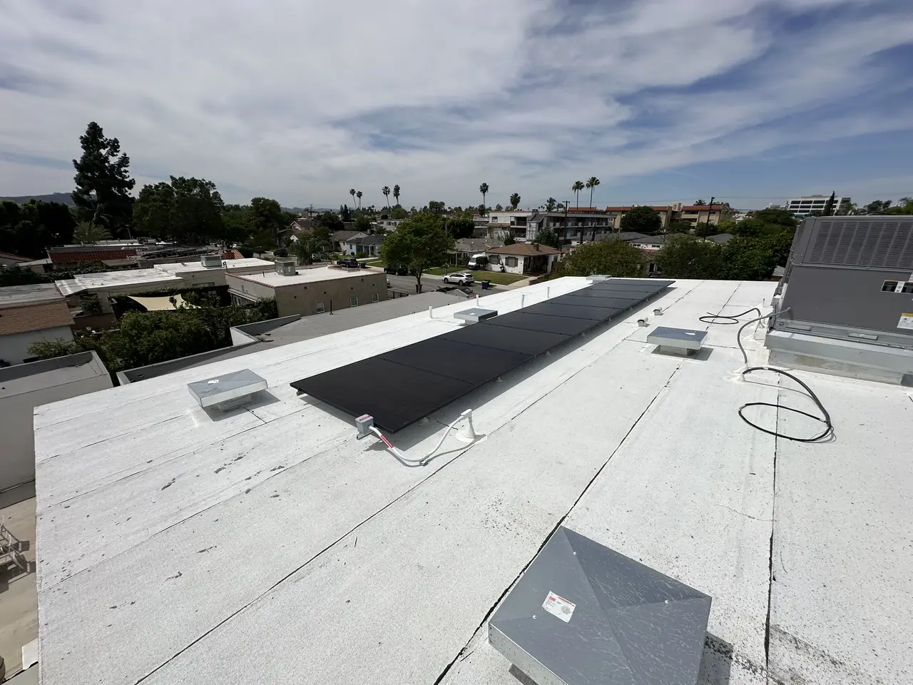 Solar panel mounting detail on a flat roof in Burbank, CA