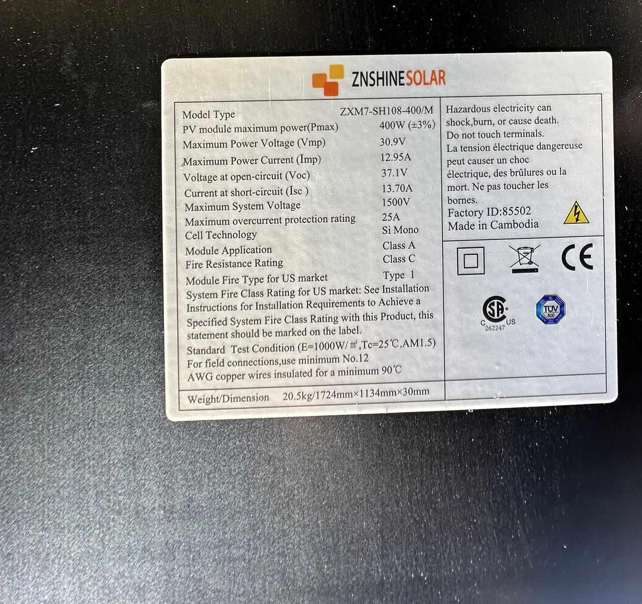 Nameplate on the back of a solar module installed in Burbank, showing model, power rating and electrical ratings