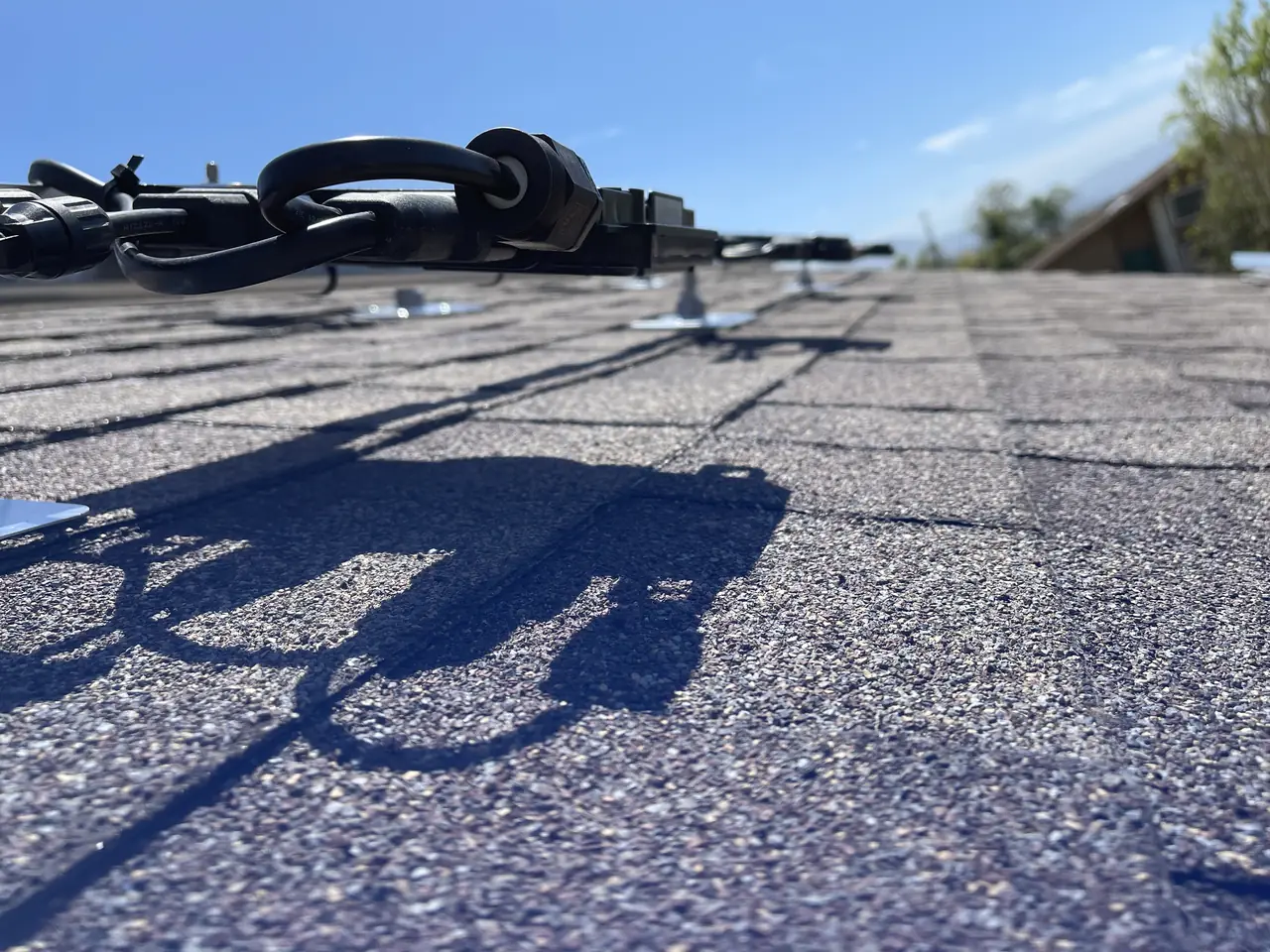Solar panel mounting detail on a composition shingle roof in Camarillo, CA