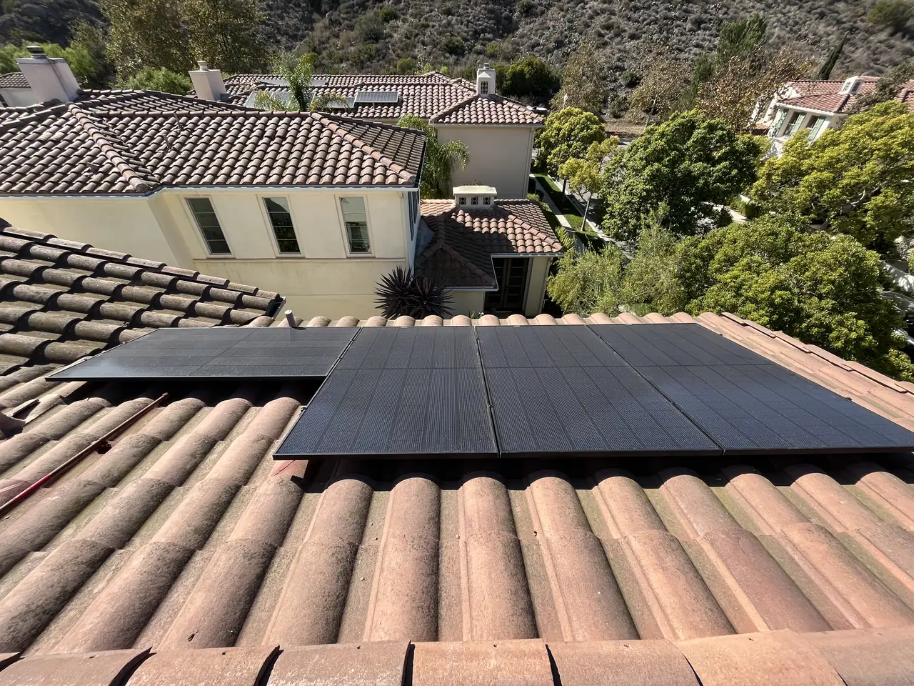 Seventeen REC panels on a barrel-tile roof in Camarillo