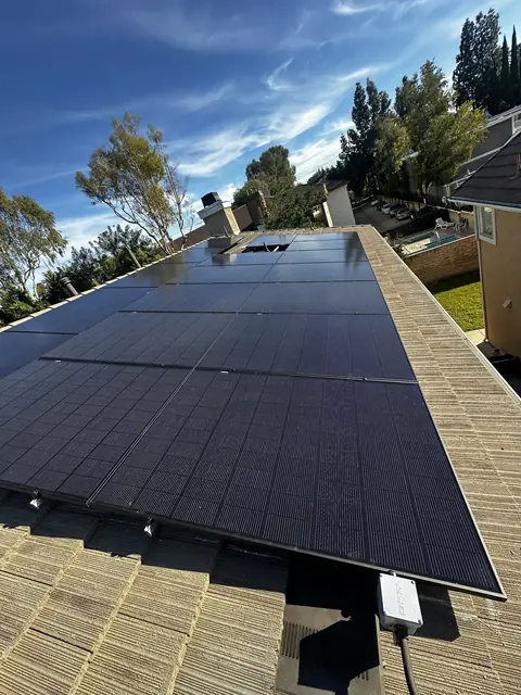 Solar panel mounting detail on a tile roof in Canoga Park, CA