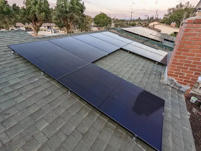 Solar panel mounting detail on a composition shingle roof in Chatsworth, CA