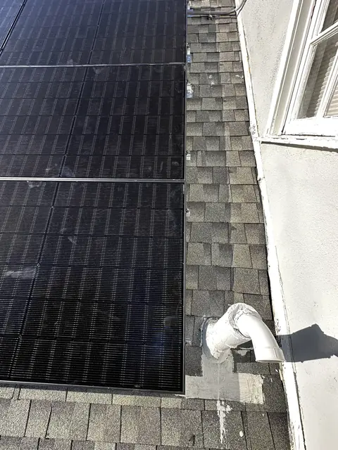 Solar panel mounting detail on a composition shingle roof in Chatsworth, CA