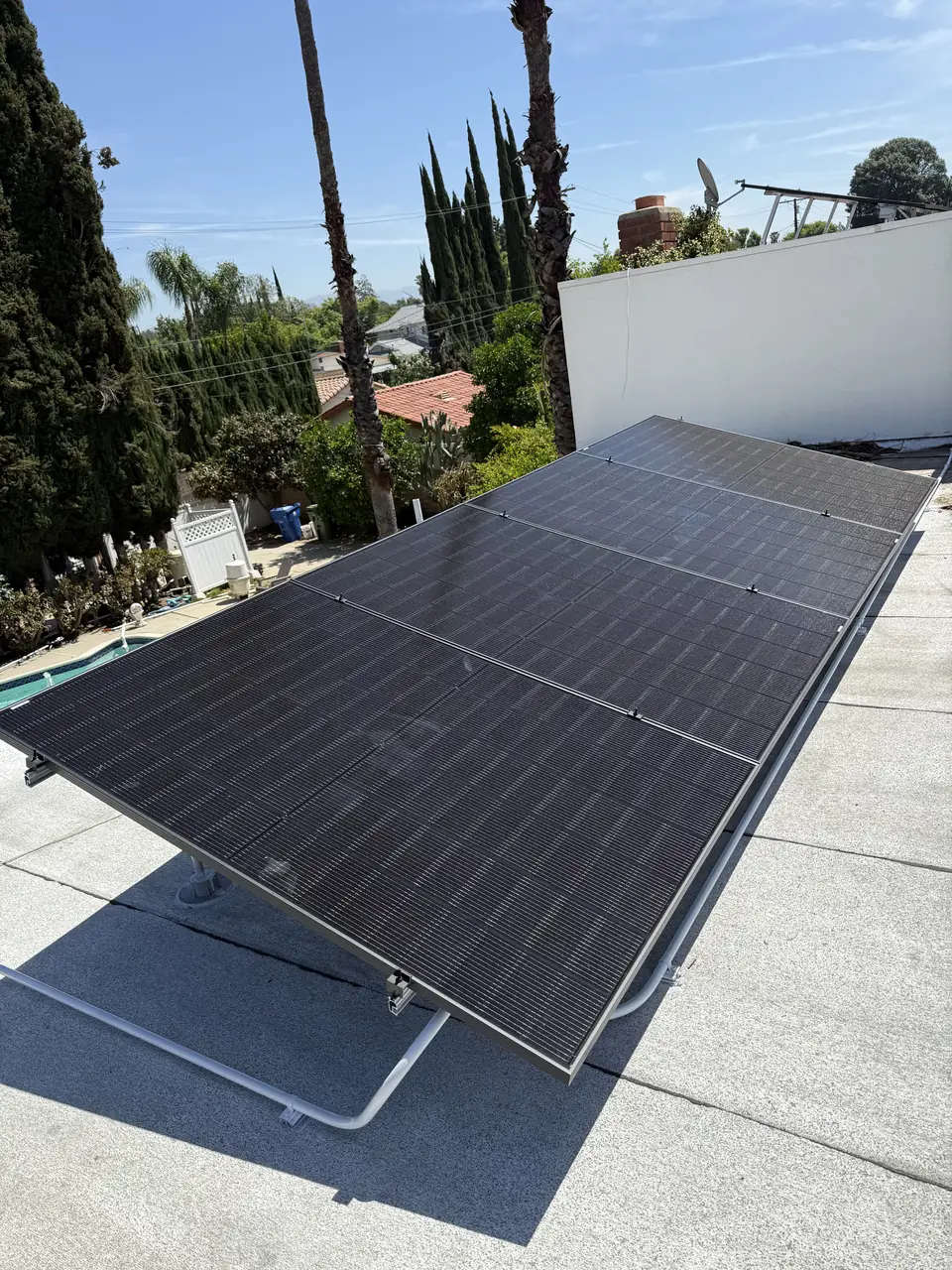 Tilt-racked solar array on a flat roof in Chatsworth