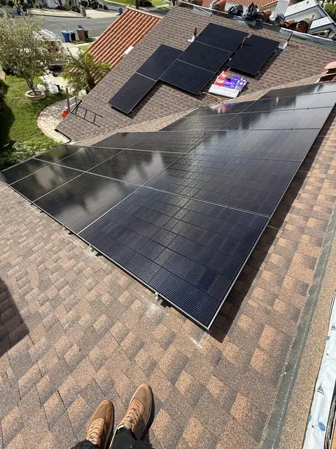Solar panel mounting detail on a composition shingle roof in Chatsworth, CA