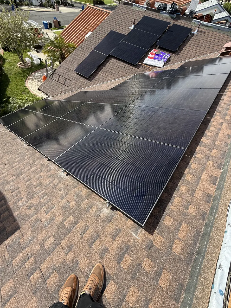 Twenty-five Canadian Solar panels on a re-decked roof in Chatsworth
