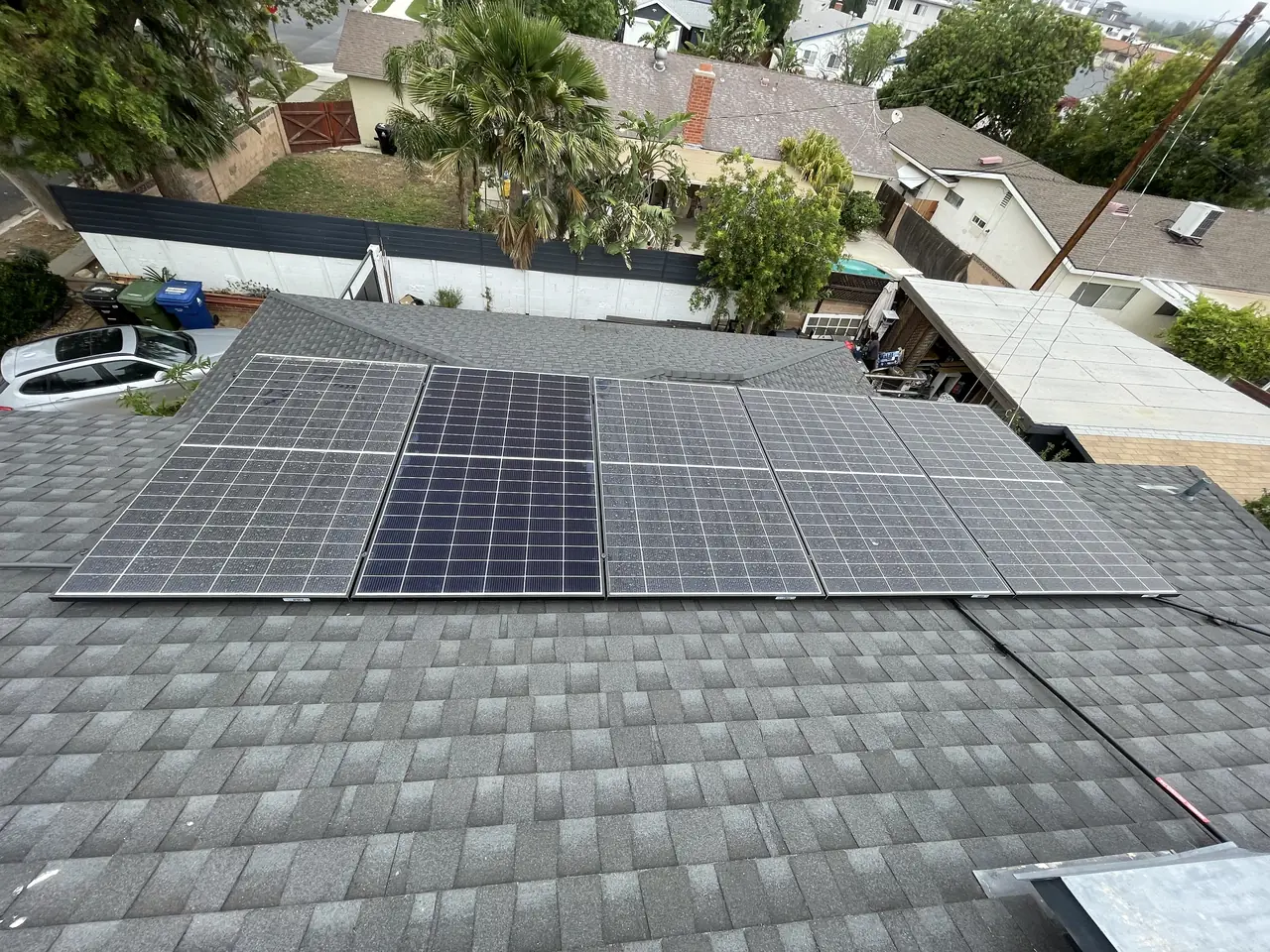 Solar modules across two planes of a composition shingle roof, Chatsworth
