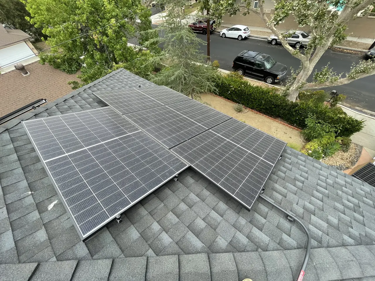 Solar array seen from above across a composition shingle roof, Chatsworth