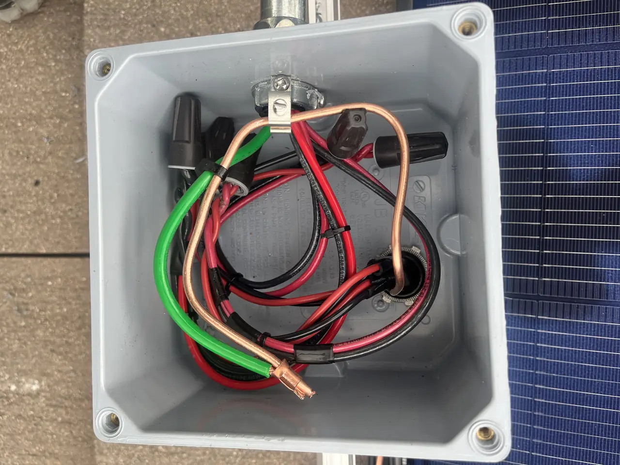 Open junction box with conductors on a roof, Chatsworth