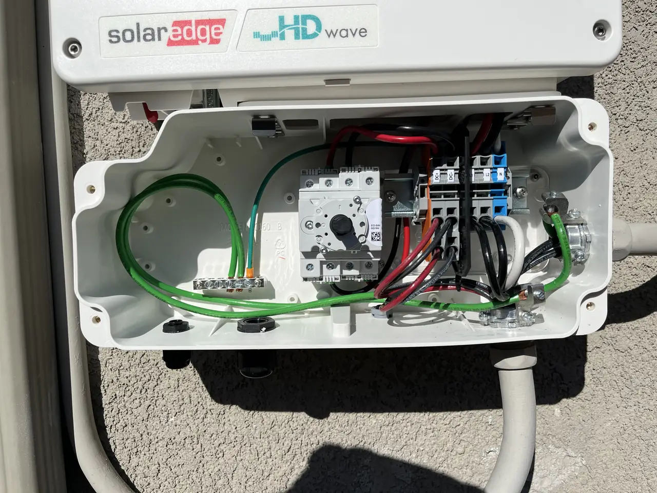 Opened SolarEdge HD-Wave inverter enclosure showing internal wiring, Chatsworth