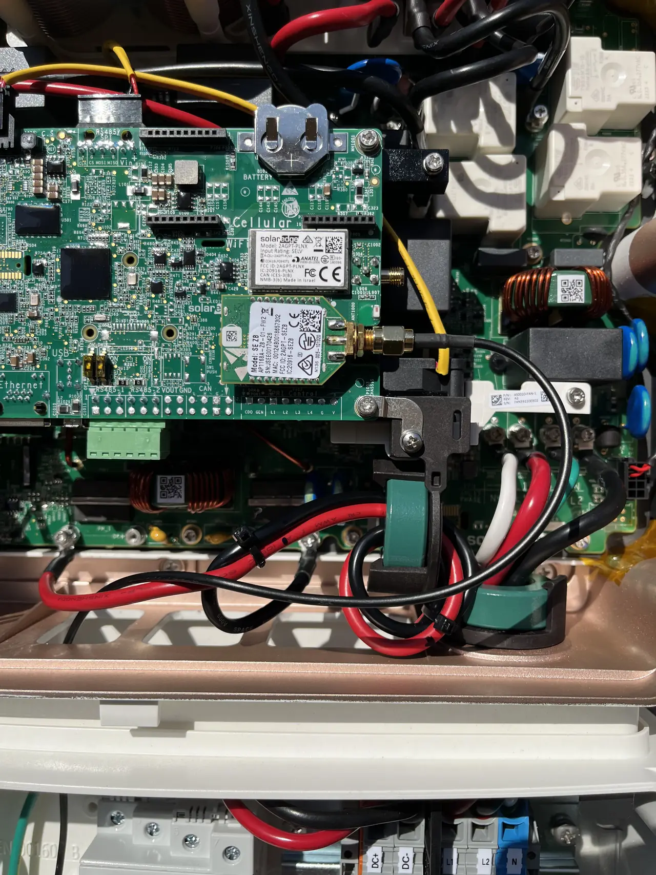 ZigBee communications module held in a gloved hand, Chatsworth