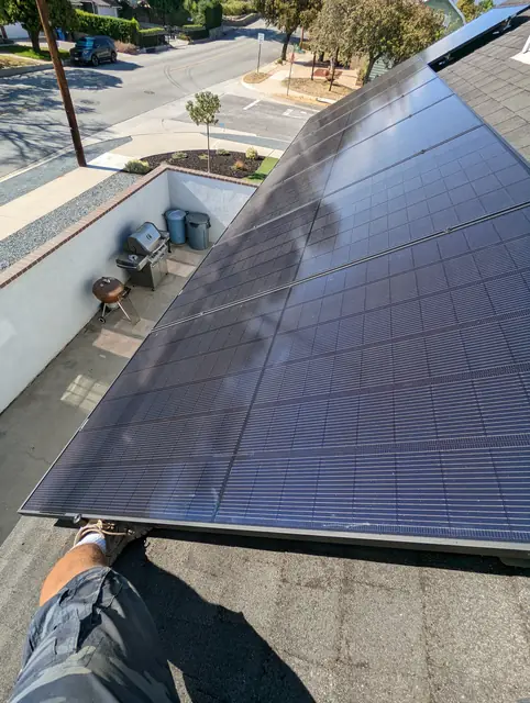 Solar panel mounting detail on a composition shingle roof in Covina, CA