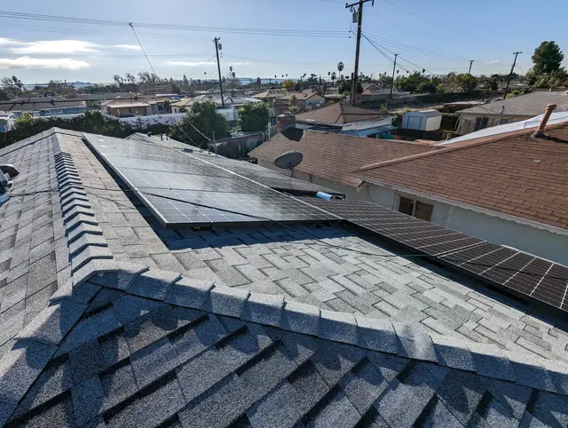 Solar panel mounting detail on a composition shingle roof in Covina, CA
