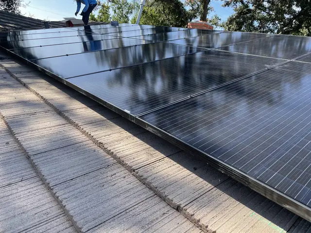 Solar panel mounting detail on a tile roof in Covina, CA