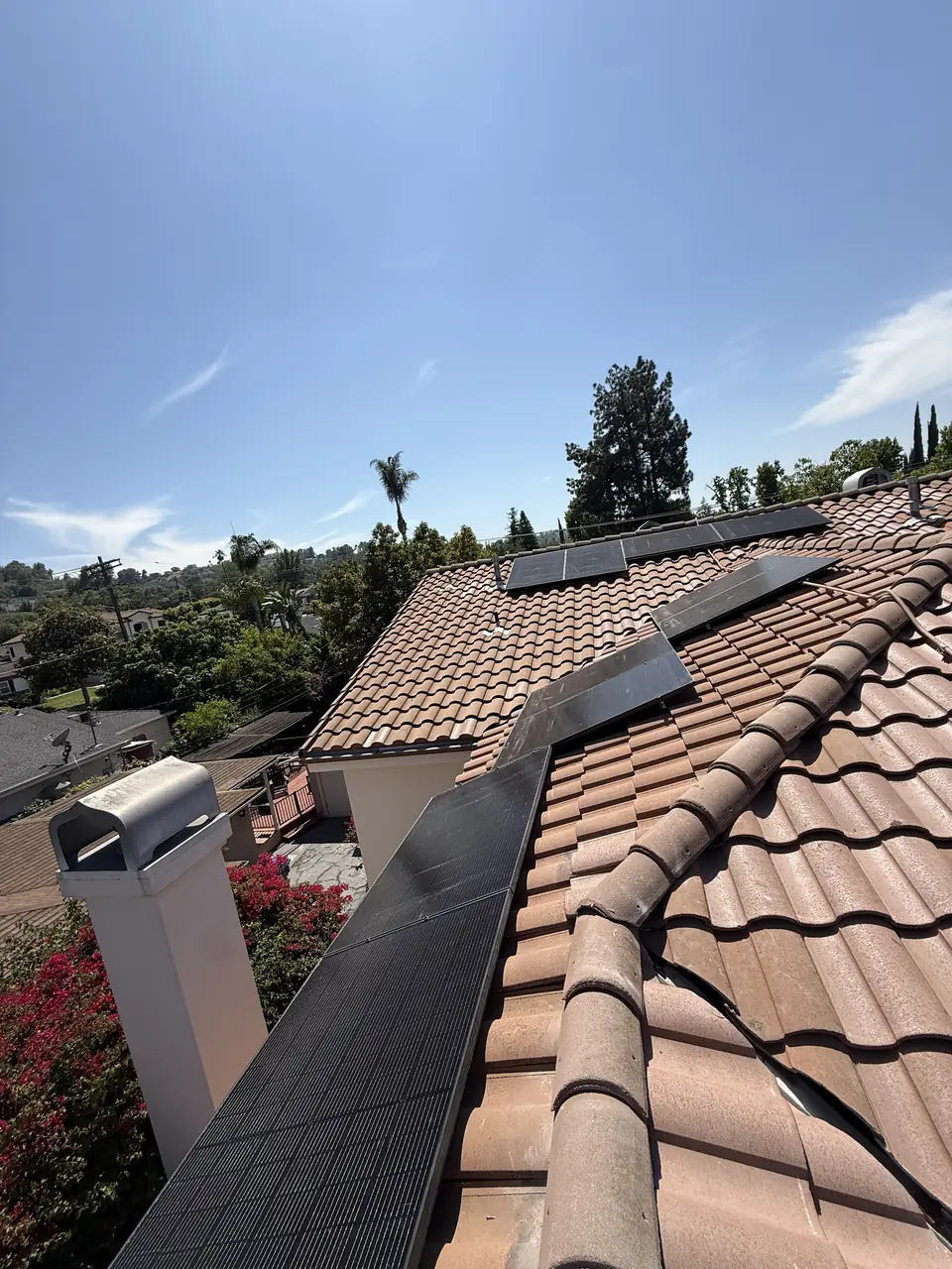 Thirty solar panels on a tile roof in Encino