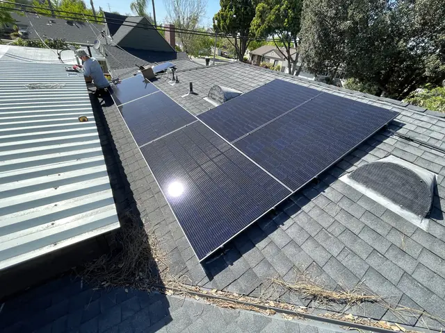 4.29 kW solar panel array on a composition shingle roof in Lakewood, CA