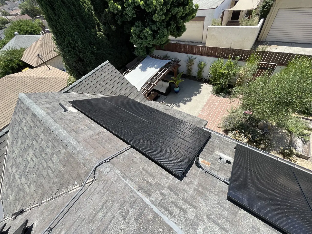 Cali Energy solar installation on a steep multi-slope roof in Long Beach, California
