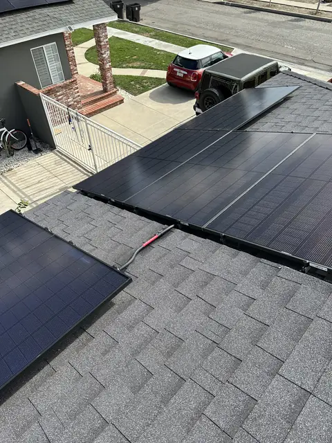 solar panel array on a composition shingle roof in Long Beach, CA