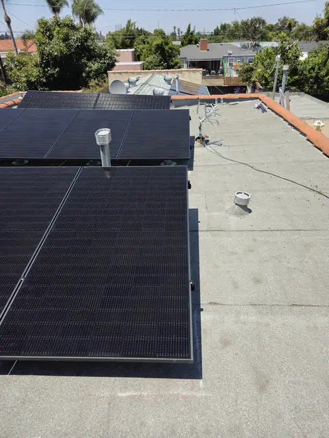 Solar panel mounting detail on a flat roof in Long Beach, CA