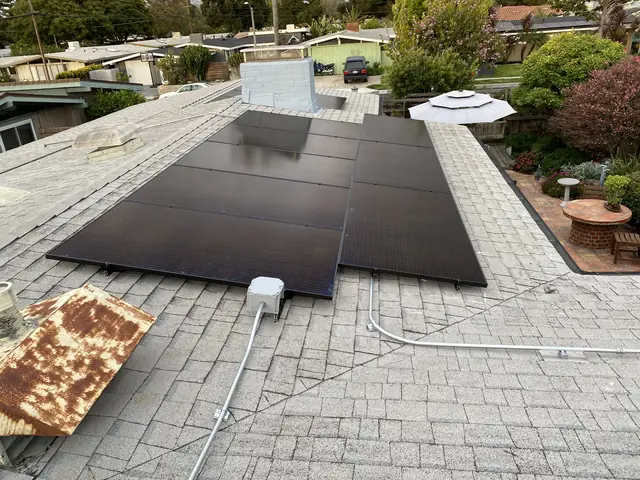 solar panel array on a composition shingle roof in Long Beach, CA