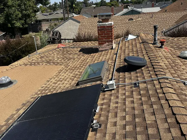 solar panel array on a composition shingle roof in Long Beach, CA