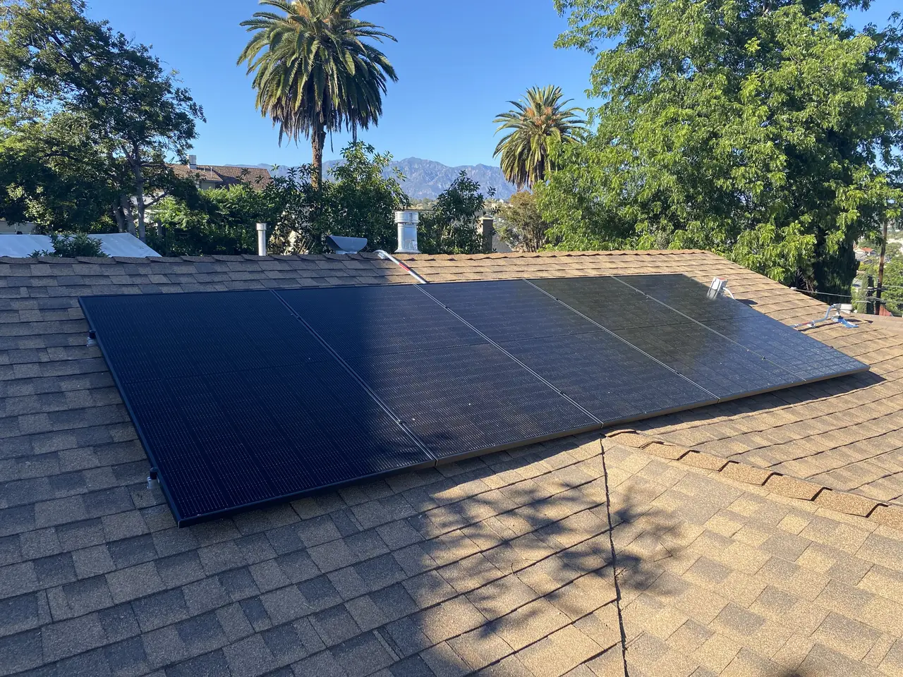Solar panel mounting detail on a tile roof in Los Angeles, CA