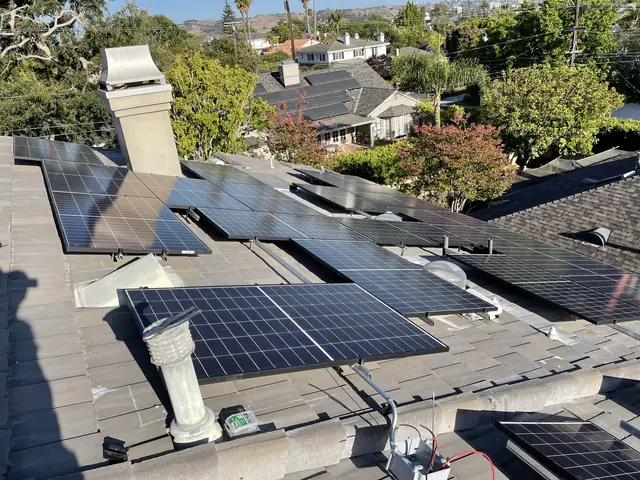 Solar panel mounting detail on a tile roof in Los Angeles, CA