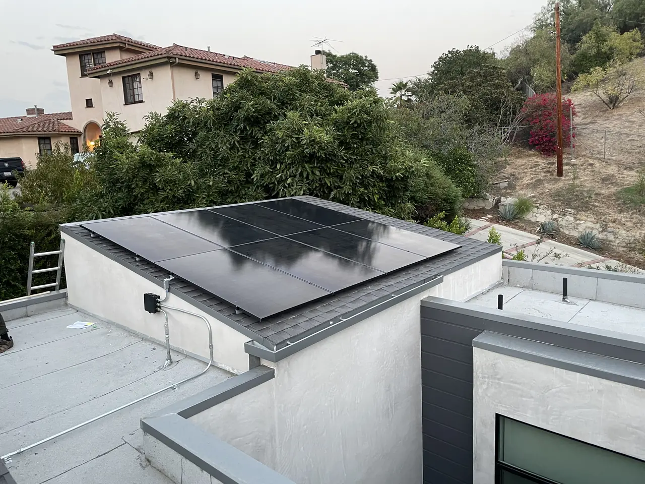 5.6 kW solar panel array on a composition shingle roof in Los Angeles, CA