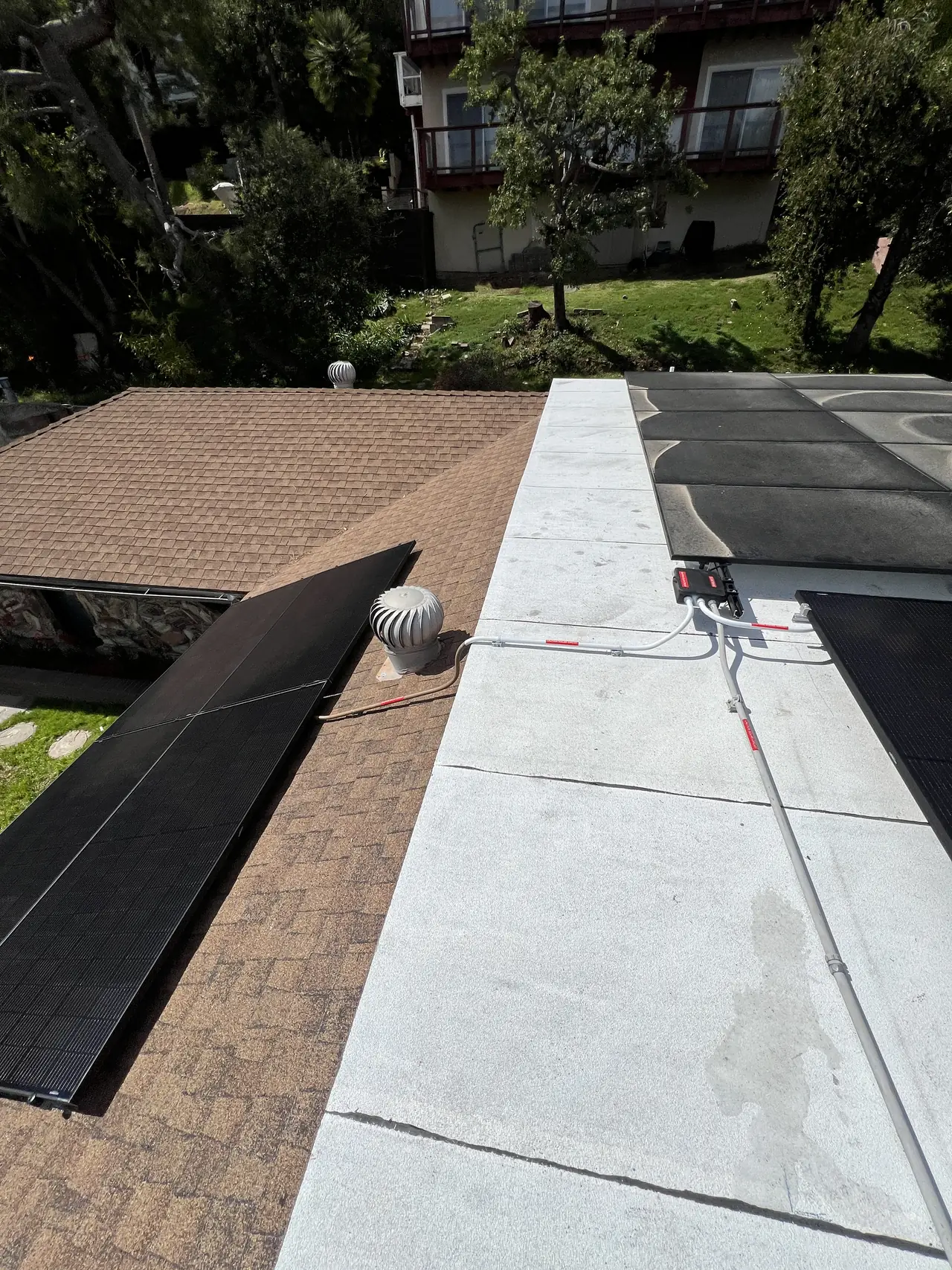 The array seen across the roof with trees behind, Glassell Park, Los Angeles