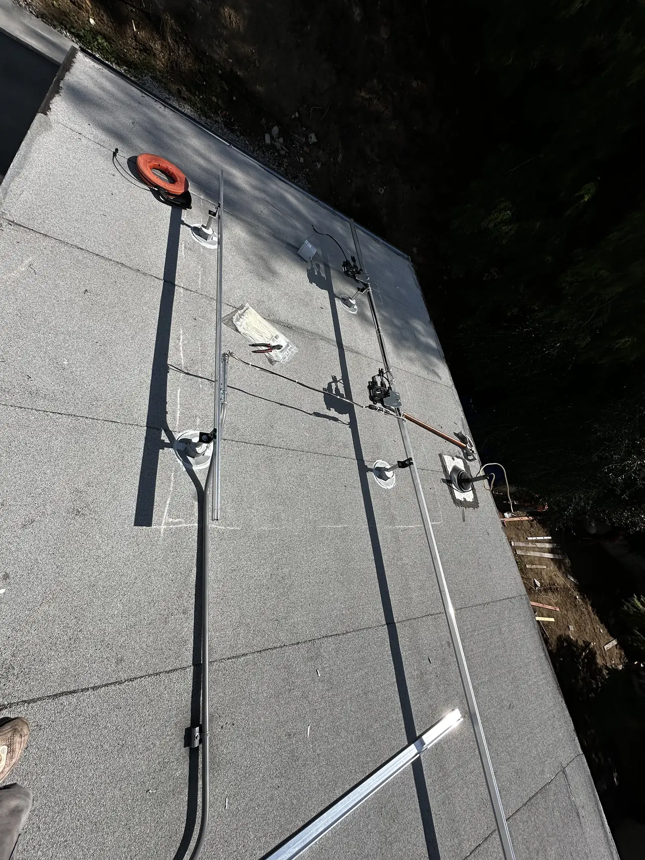 Mounting rail and attachment on a flat roof, Echo Park, Los Angeles