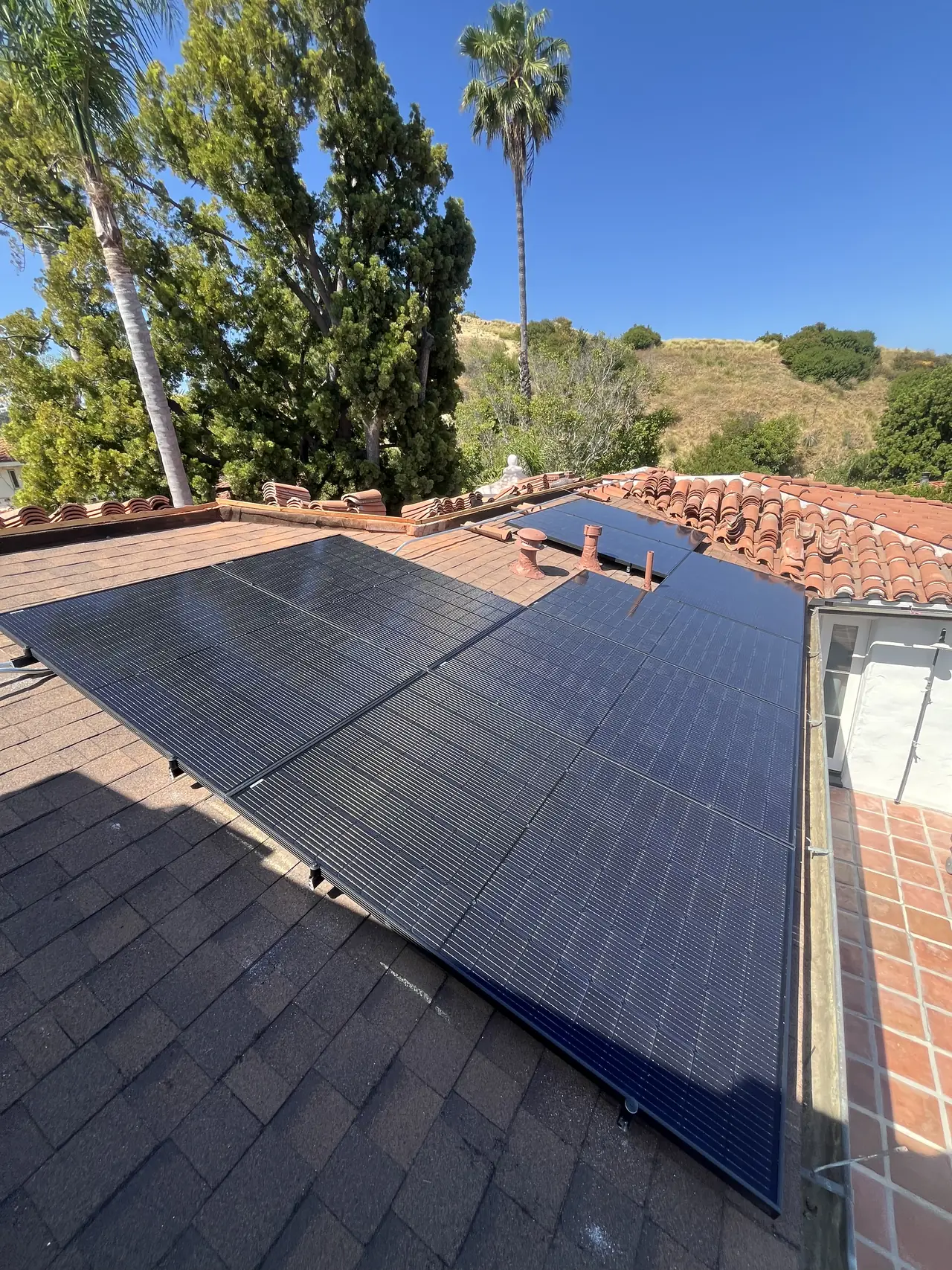 The array laid where the tile was removed, with the remaining tile around it, Hollywood Hills, Los Angeles