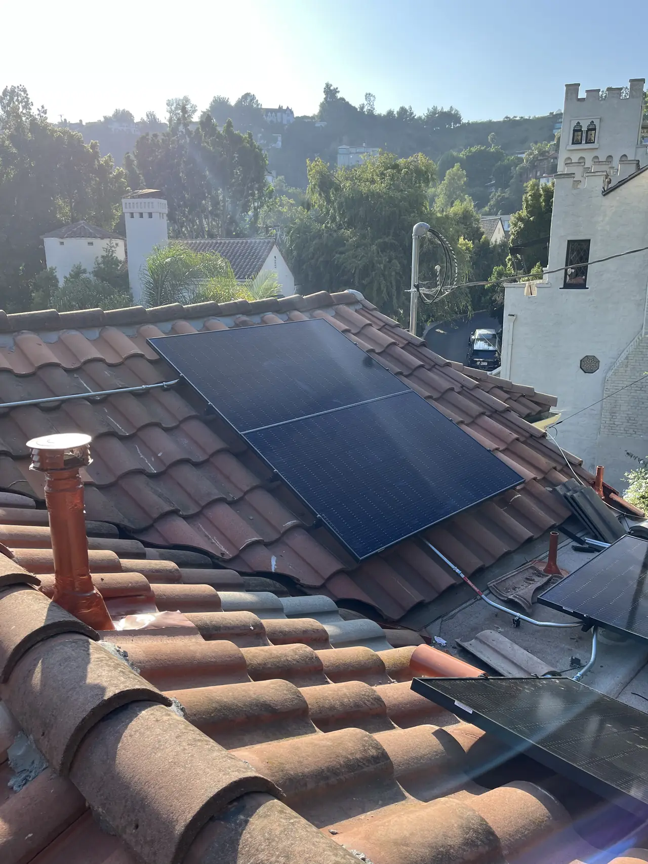 A tile roof and the neighborhood below, Hollywood Hills, Los Angeles