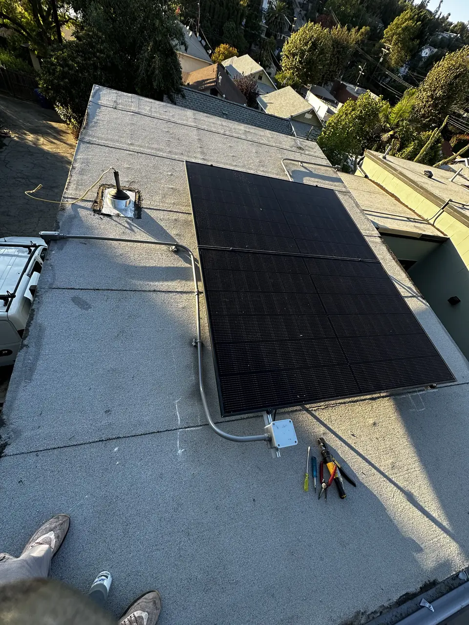 1.7 kW solar panel array on a flat roof in Los Angeles, CA