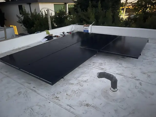 4.25 kW solar panel array on a flat roof in Los Angeles, CA