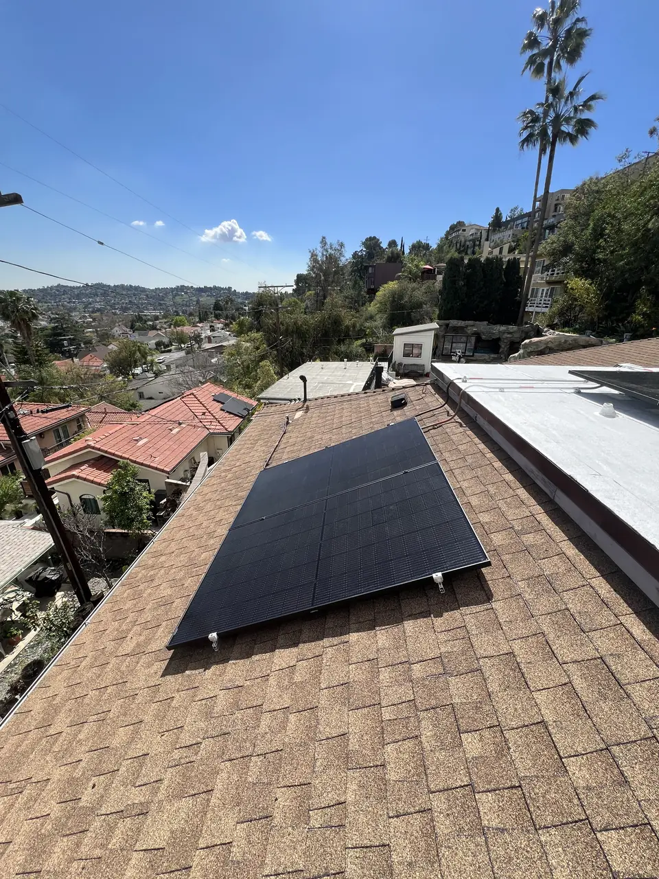 solar panel array on a composition shingle roof in Los Angeles, CA