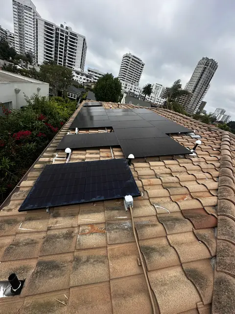 Solar panel mounting detail on a tile roof in Los Angeles, CA