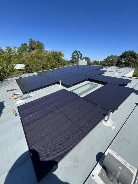 8.8 kW solar panel array on a metal roof in Los Angeles, CA