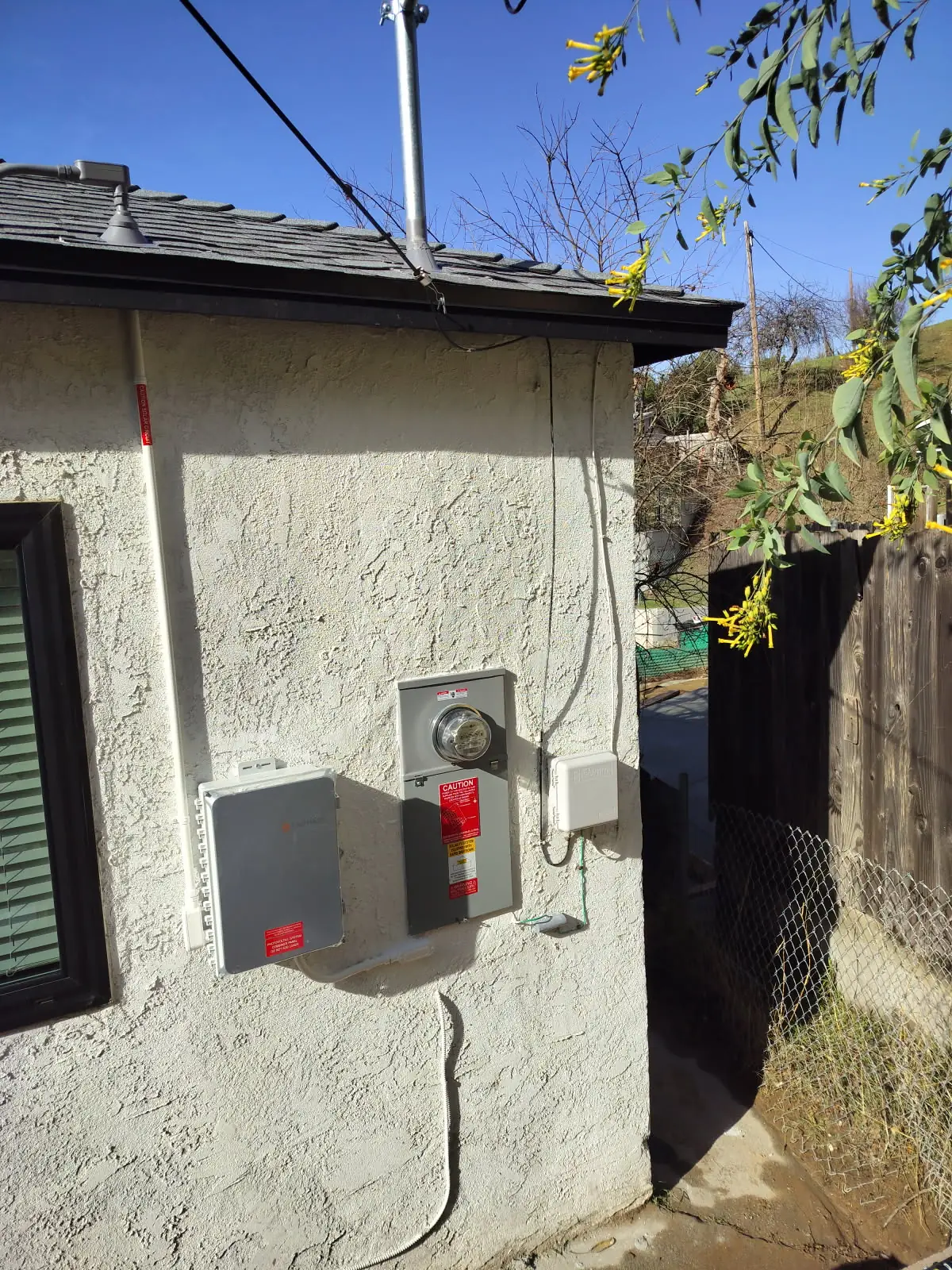 Service equipment on the exterior wall of a hillside house, Glassell Park, Los Angeles