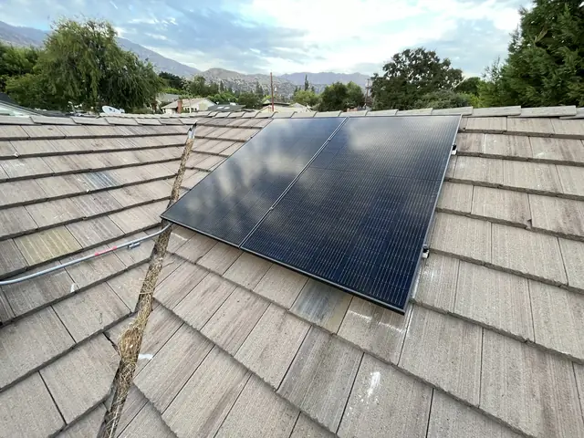 Solar panel mounting detail on a tile roof in Monrovia, CA
