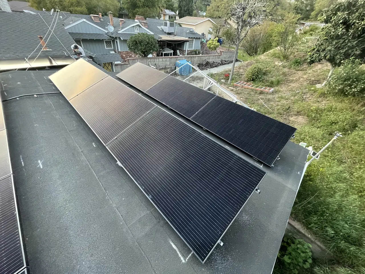 13.77 kW solar panel array on a flat roof in Monrovia, CA