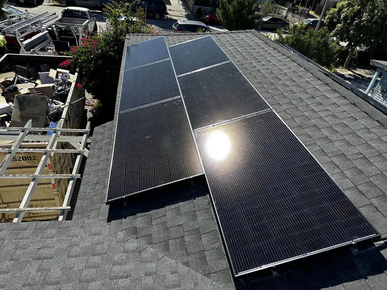 Solar panel mounting detail on a composition shingle roof in North Hollywood, CA