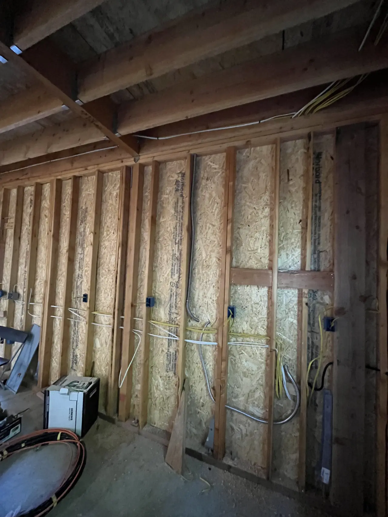 Interior framing of a new dwelling with electrical runs across the studs, North Hollywood