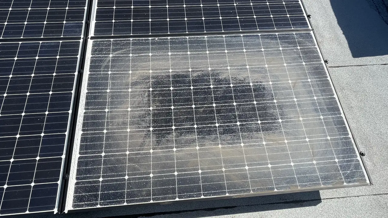 A second solar module showing a dark irregular patch across its cells, North Hollywood